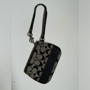 Black and Tan Coach Wristlet